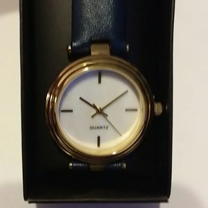 Avon navy blue watch